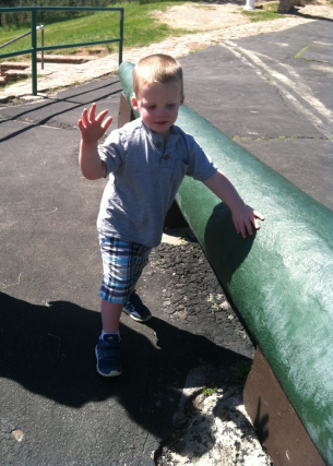 Liam walking beside a concert cylinder.